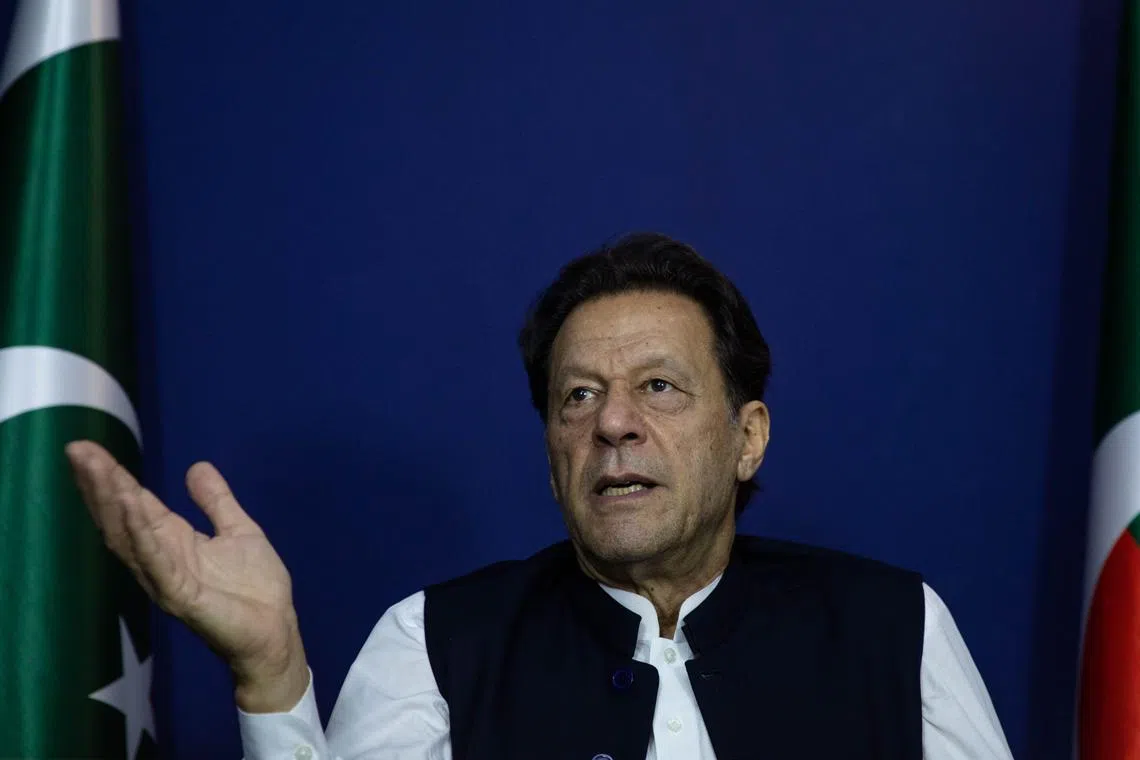 Ex-Pakistan PM Imran Khan speaks during an interview at his heavily guarded home in Lahore.