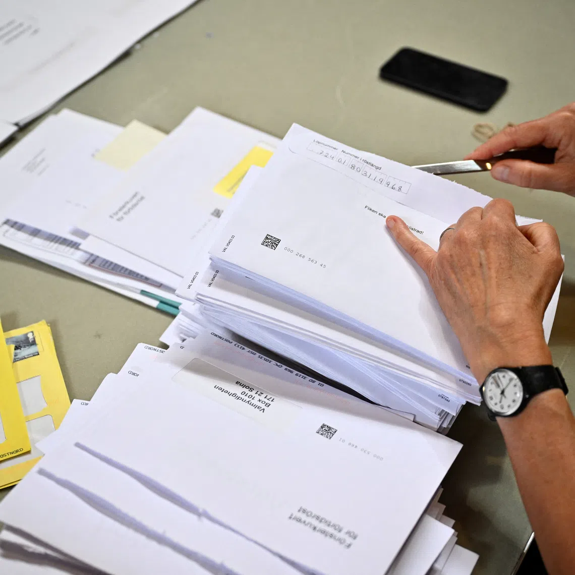 An election workers counts early votes and overseas votes at Stockholm City Hall, in Stockholm, Sweden, September 16, 2026. TT News Agency/Christine Olsson via REUTERS
