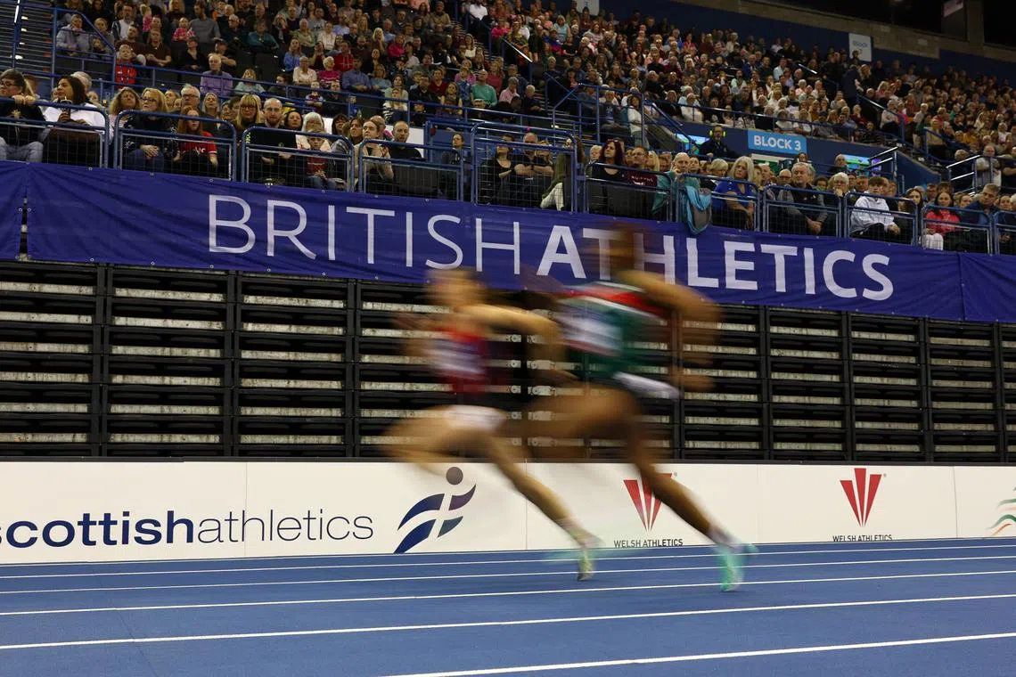 FILE PHOTO: Athletics - UK Athletics Indoor Championships - Utilita Arena, Birmingham, Britain - February 18, 2024 General view during the women's 200m heats REUTERS/Andrew Boyers
