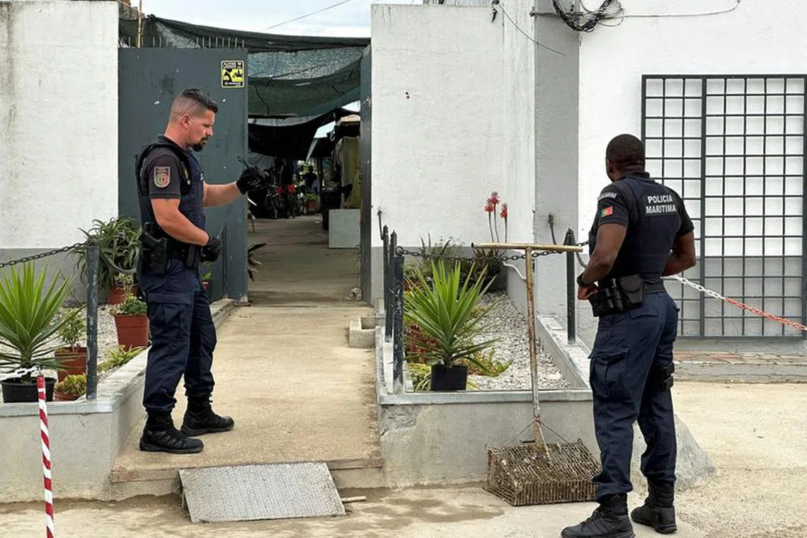 Portuguese maritime police at one of two sites where hundreds of human trafficking victims, mostly migrants from Southeast Asia, were found near Portugal's capital Lisbon, in Samouco, Portugal, June 21, 2023. REUTERS/Miguel Pereira/File Photo