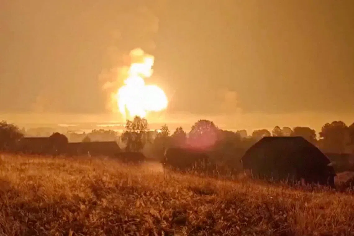 Flames rise during an explosion, amid the Russia-Ukraine conflict, in Toropets, Tver region, Russia in this screen grab obtained from a social media video released on September 18, 2024. Social Media/via REUTERS
