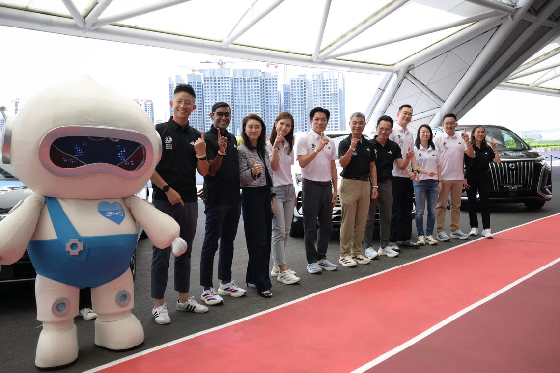 James Ng (fifth from left), managing director of BYD Singapore and president of BYD Philippines, at the March 17 launch of the Dec 4-6 BYD Singapore International Marathon at the National Stadium.