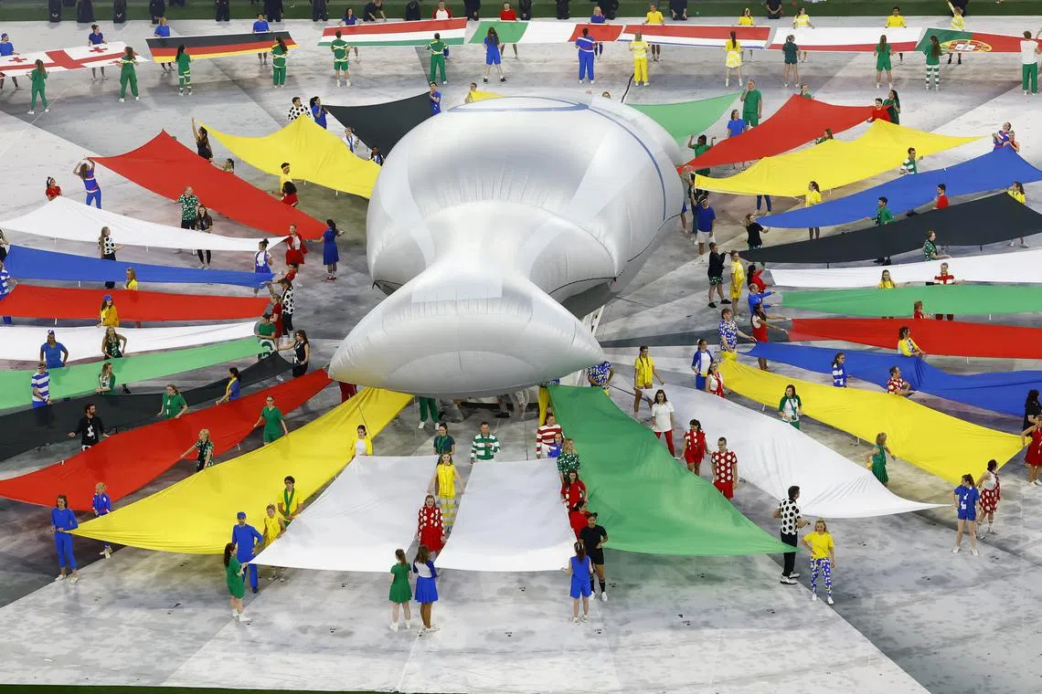 FILE PHOTO: Soccer Football - Euro 2024 - Group A - Germany v Scotland - Munich Football Arena, Munich, Germany - June 14, 2024  A giant replica European Championship Trophy is displayed during the pre match show inside the stadium before the match REUTERS/Michaela Stache/File Photo