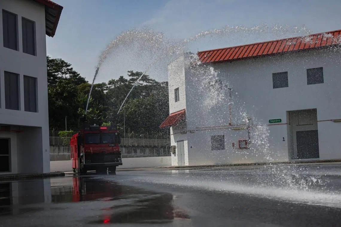 A demonstration of the new water cannon vehicle at the Home Team Tactical Centre on March 27.