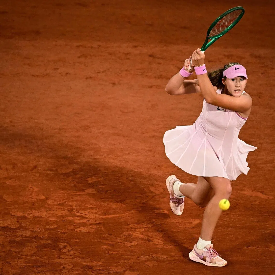 Russia's Mirra Andreeva playing a backhand return during her 6-0, 6-3 French Open quarter-final win over Romania's Sorana Cirstea on Court Philippe-Chatrier at Roland-Garros in Paris on June 2, 2026.