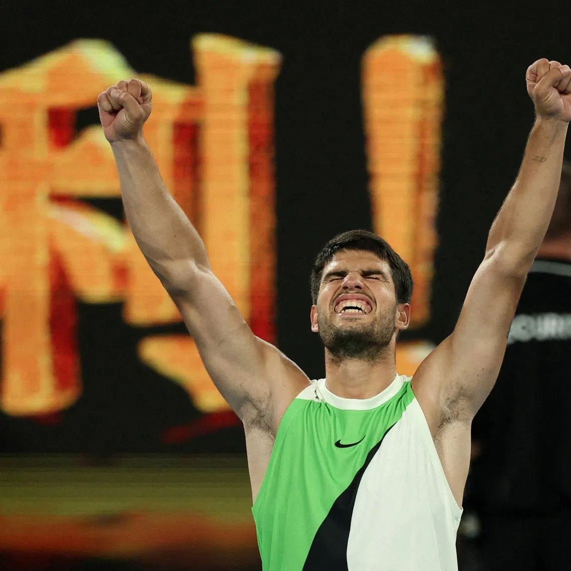 Tennis - Australian Open - Melbourne Park, Melbourne, Australia - January 27, 2026 Spain's Carlos Alcaraz celebrates winning his quarter final match against Australia's Alex De Minaur REUTERS/Edgar Su