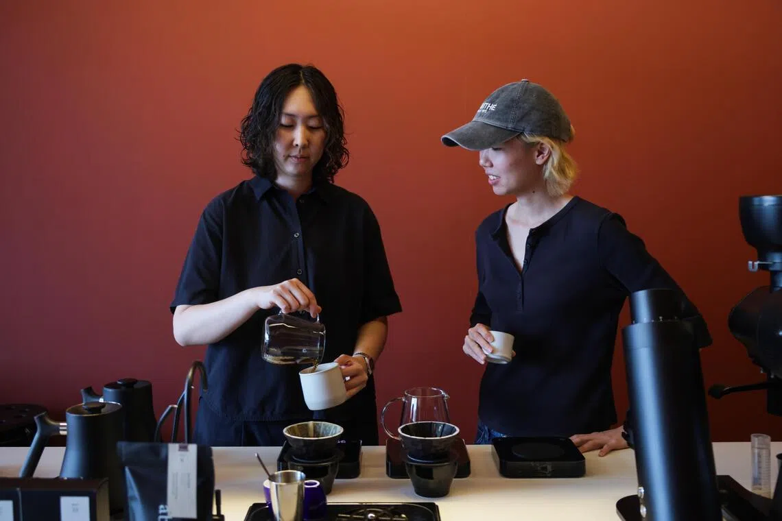 Co-founders of abseil Glenda Leong (left) and Chelsea Woo focus on proper pourovers.