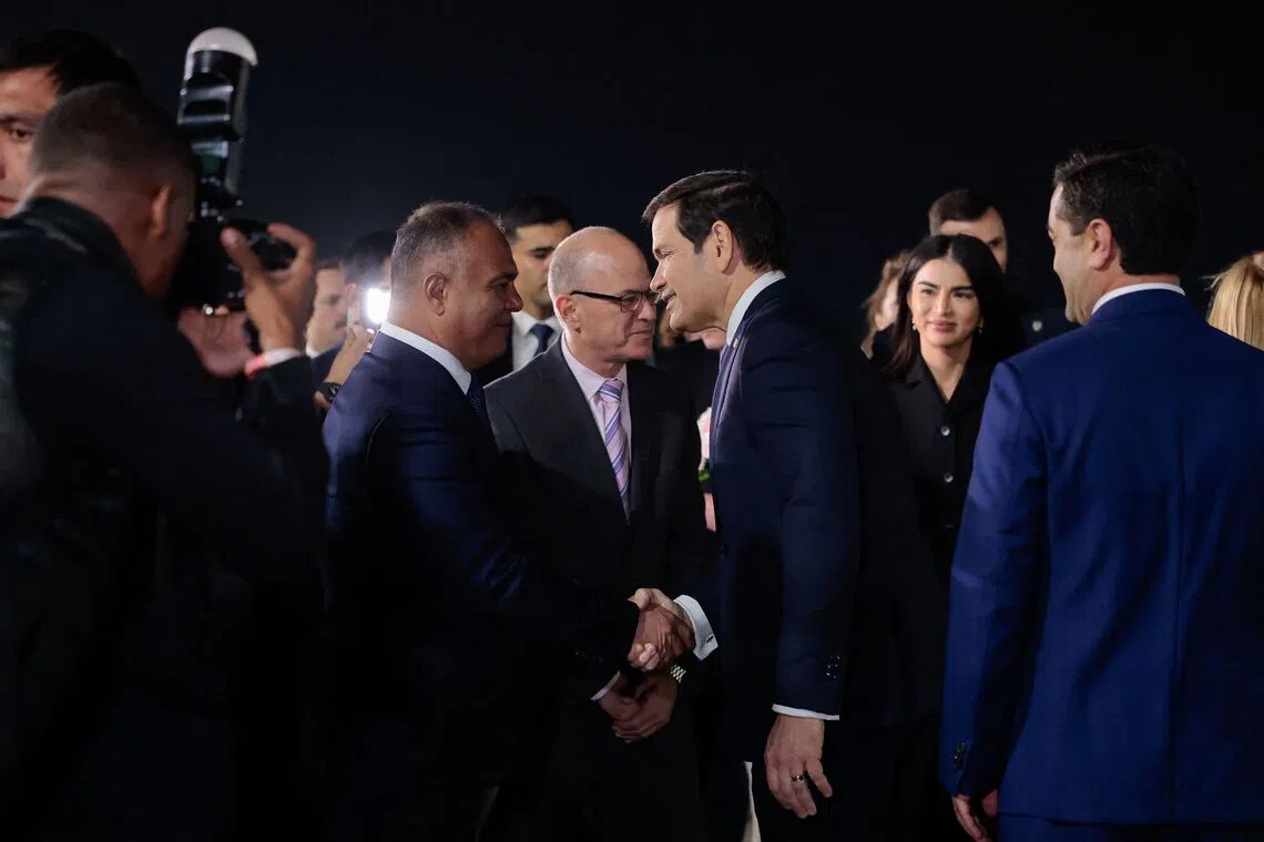 Samarkand Governor Adiz Boboev welcomes US Secretary of State Marco Rubio as he arrives at the airport, to participate in the C5+1 Ministerial meeting, in Samarkand, Uzbekistan, on Oct 18.
