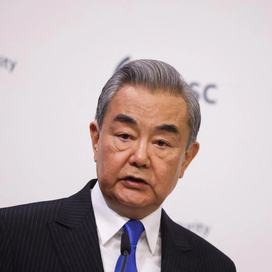 China's Foreign Minister Wang Yi speaks during the Munich Security Conference (MSC) in Munich, Germany, February 14, 2026. REUTERS/Liesa Johannssen