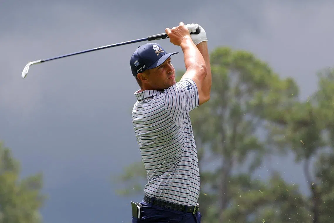Golf - The Masters - Augusta National Golf Club, Augusta, Georgia, U.S. - April 11, 2024 Bryson DeChambeau of the U.S. hits his tee shot on the 4th hole during the first round REUTERS/Brian Snyder