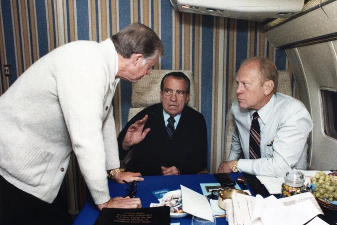 epa11798028 (FILE) - A handout photo made available by the Jimmy Carter Library shows former US presidents Jimmy Carter (L), Richard M. Nixon (C) and Gerald R. Ford (R) aboard a airplane flying to attend the funeral of slain Egyptian President Anwar al Sadat in Cairo, Egypt, 10 October 1981 (reissued 29 December 2024). Carter died on 29 December 2024 at his home in Plains, Georgia, The Carter Center confirmed. He was 100, the longest-lived president in US history. He took office as President of the United States on 20 January 1977 and succeeded Gerald Ford until he left office on 20 January 1981 to his successor Ronald Reagan. James Earl ‘Jimmy‘ Carter, Jr. was born on 01 October 1924 in the village of Plains, Georgia, USA. After school he enrolled in the US Navy until 09 October 1953 after which he returned to his native village to extend the family peanut farm. In 1961 Jimmy Carter was elected to the state senate and on 12 January 1971 he became Governor of Georgia. In 2002 he became the only US President to receive the Nobel Peace Prize after leaving office. Outside of his political career Jimmy Carter was also known for his volunteer work with the ‘Habitat for Humanity’ organization. EPA-EFE/JACK KIGHTLINGER / JIMMY CARTER LIBRARY / HANDOUT HANDOUT EDITORIAL USE ONLY/NO SALES