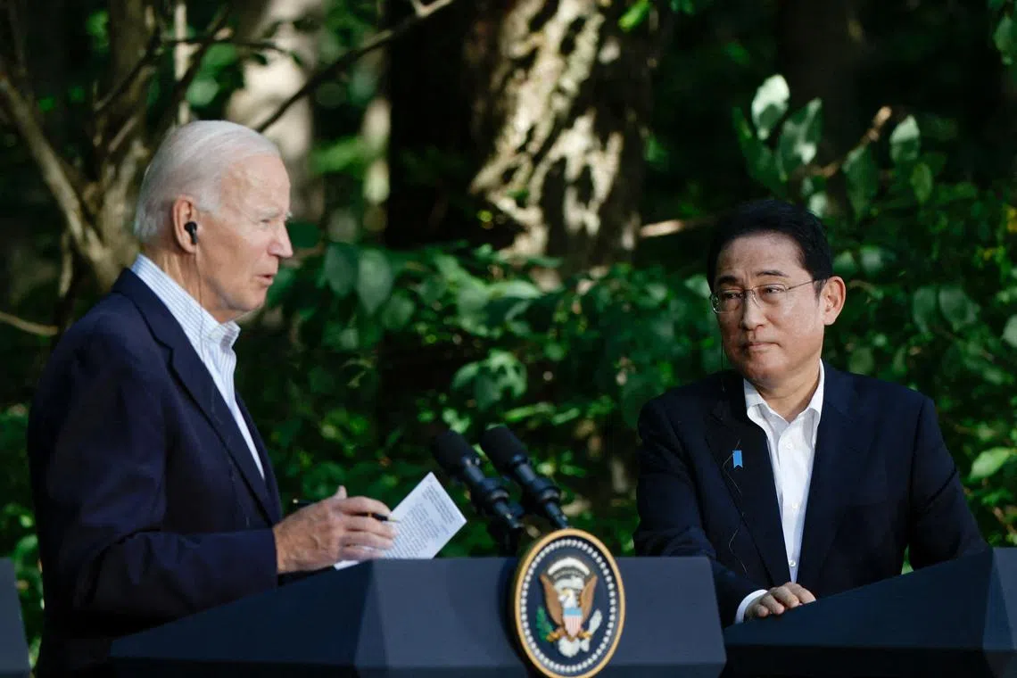 Japanese PM Fumio Kishida (right) and US President Joe Biden at a trilateral summit at Camp David near Thurmont, Maryland, on Aug 18, 2023.