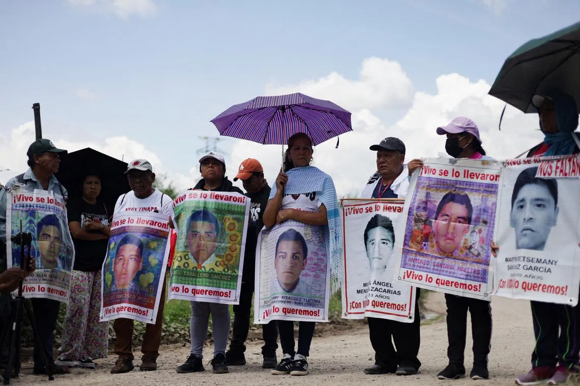 Relatives of the missing students from the Raul Isidro Burgos Rural Teachers' College in Ayotzinapa participate in a protest to mark the 11th anniversary of the disappearance of 43 students, in Iguala, Mexico, September 27, 2025. REUTERS/Oscar Guerrero