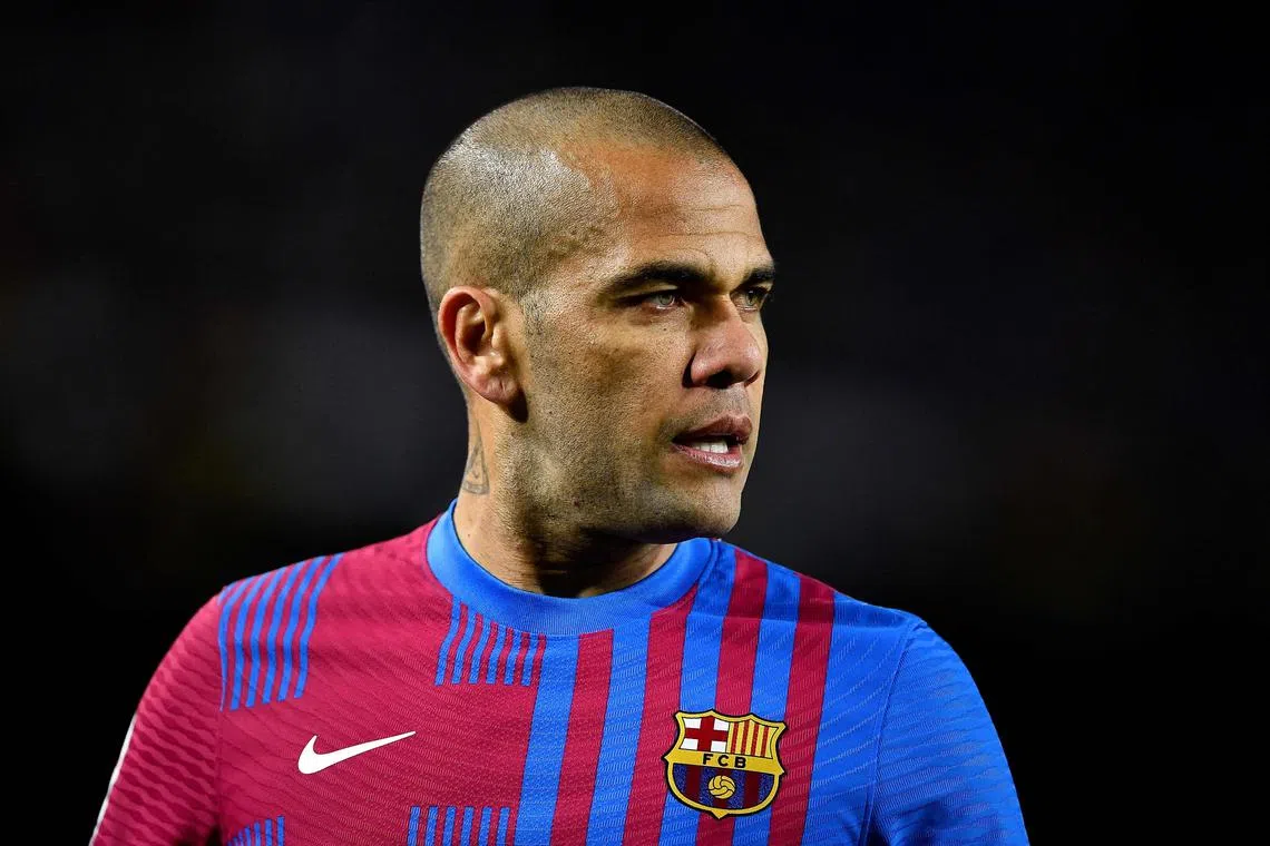 Barca's Brazilian defender Dani Alves is being held without bail in Barcelona, after being accused of rape.