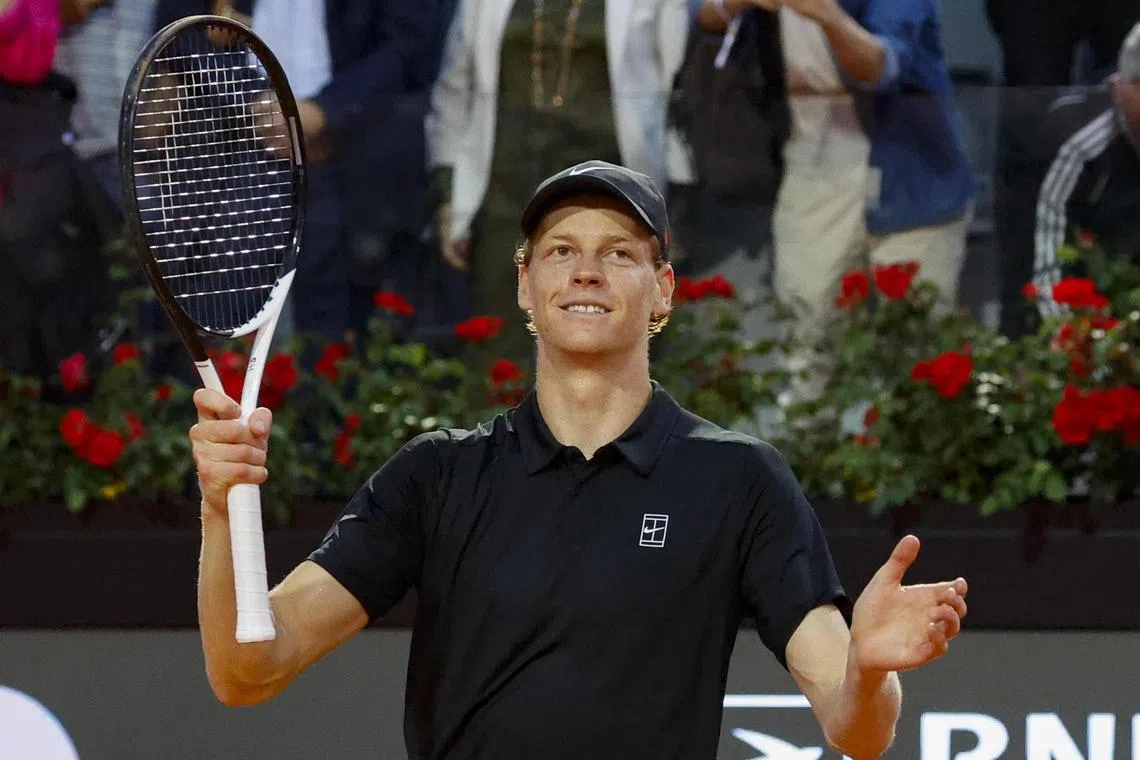 Italy's Jannik Sinner celebrates after winning his men’s quarter-final match against Casper Ruud of Norway.
