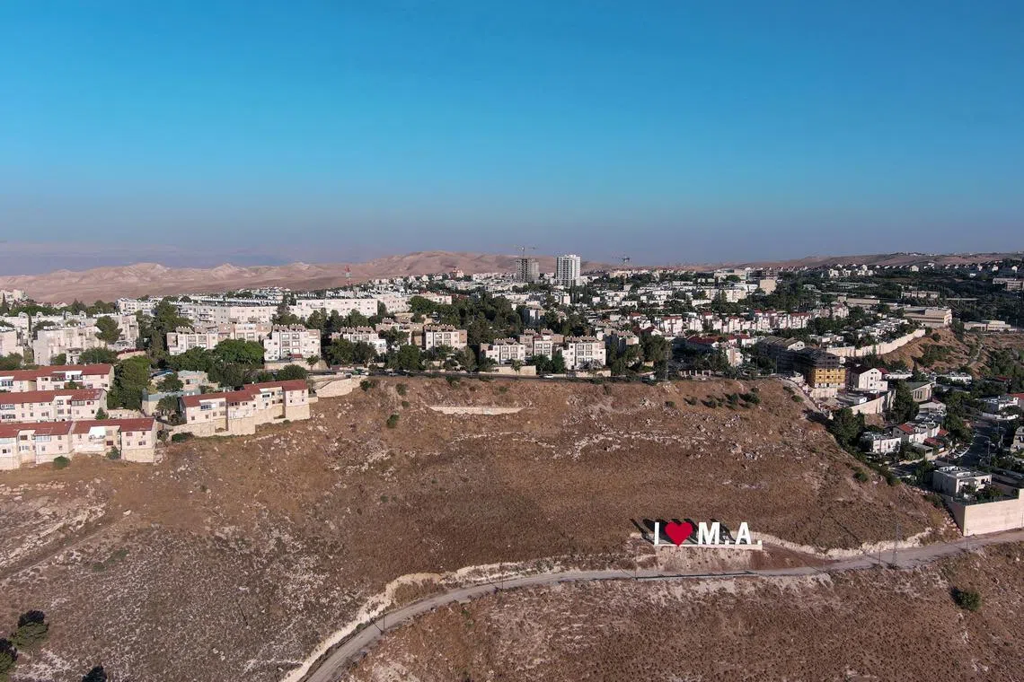 FILE PHOTO: An aerial view shows the Jewish settlement of Maale Adumim in the Israeli-occupied West Bank, June 25, 2023. REUTERS/Ilan Rosenberg/File Photo