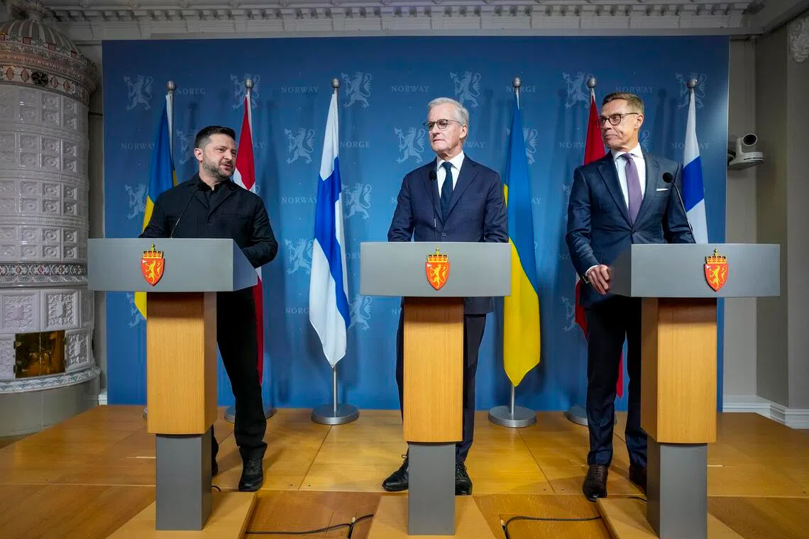 Ukrainian President Volodymyr Zelensky (left) taking part in a press briefing in Oslo, Norway, on Oct 20, with Norway’s Prime Minister Jonas Gahr Store (centre) and Finnish President Alexander Stubb.