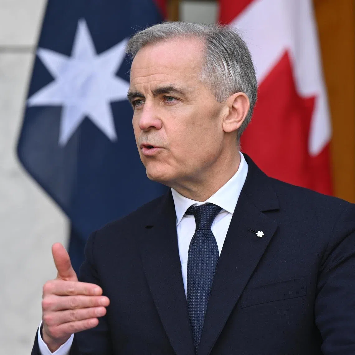 Canadian Prime Minister Mark Carney speaks to the media during a joint press conference with Australian Prime Minister Anthony Albanese at Parliament House in Canberra, Australia, on March 5, 2026.