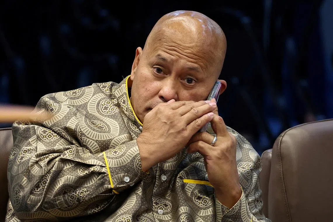 FILE PHOTO: Philippine Senator Ronald \"Bato\" dela Rosa, the chief enforcer of former president Rodrigo Duterte's drug war, takes a phone call during a session at the Senate, which holds him under protective custody amid an International Criminal Court warrant, in Pasay City, Metro Manila, Philippines, May 13, 2026. REUTERS/Eloisa Lopez/File Photo