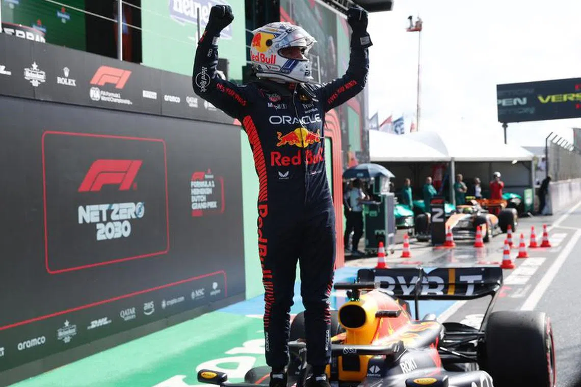 Formula One F1 - Dutch Grand Prix - Circuit Zandvoort, Zandvoort, Netherlands - August 26, 2023 Red Bull's Max Verstappen celebrates after qualifying in pole position REUTERS/Yves Herman