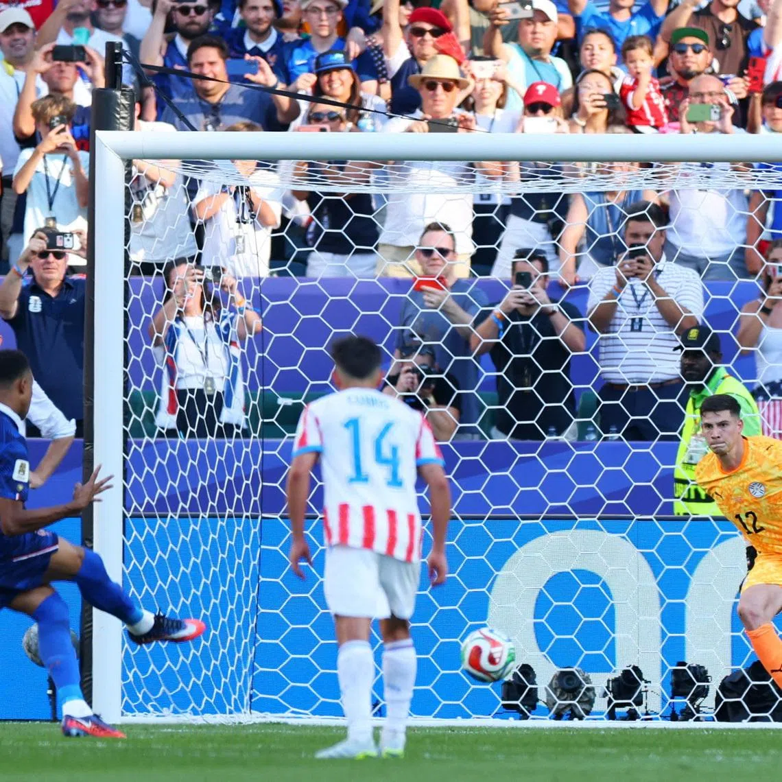 Soccer Football - FIFA World Cup 2026 - Round of 16 - Paraguay v France - Philadelphia Stadium, Philadelphia, Pennsylvania, U.S. - July 4, 2026  France's Kylian Mbappe scores their first goal from the penalty spot REUTERS/Mike Segar