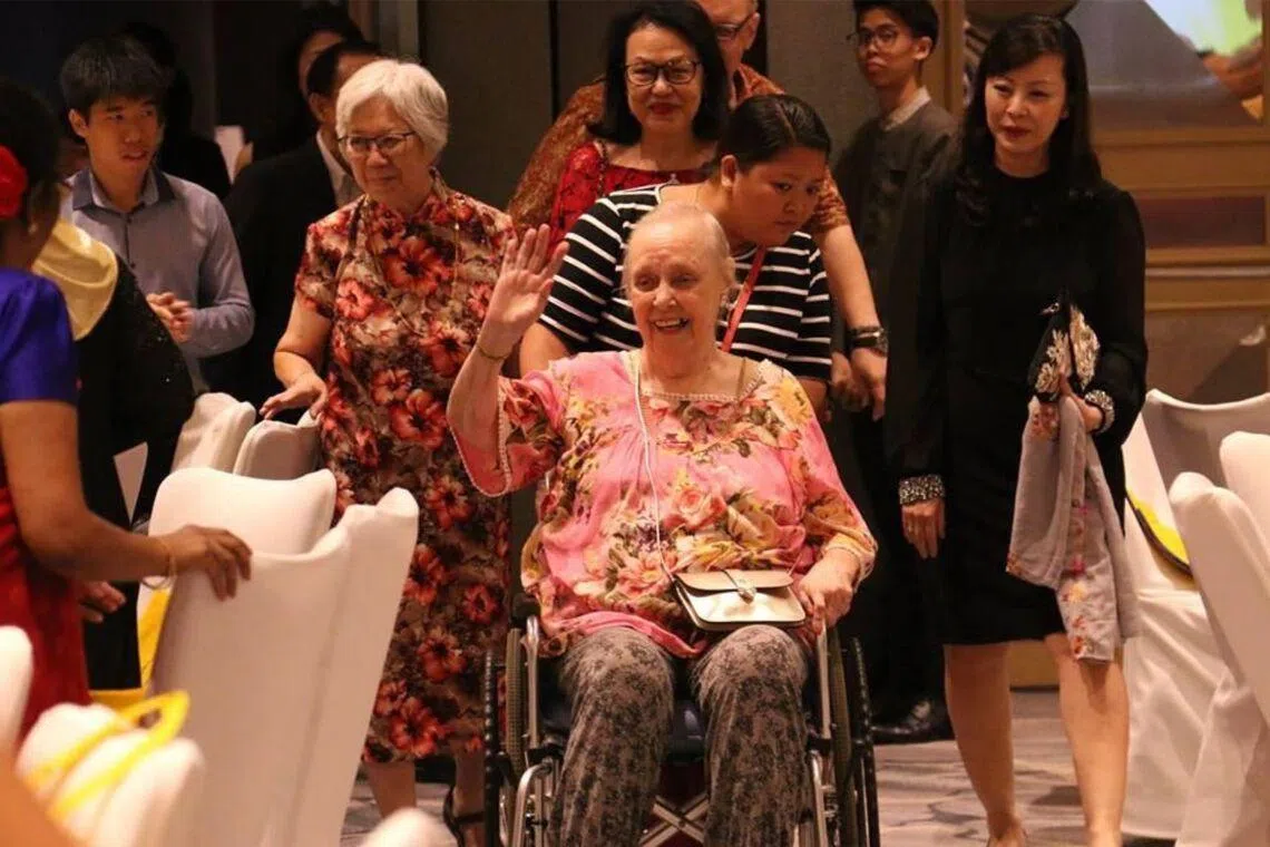 Mrs Claudette Poulier (centre) taught at Paya Lebar Methodist Girls' School for half a century and is fondly remembered by her students.