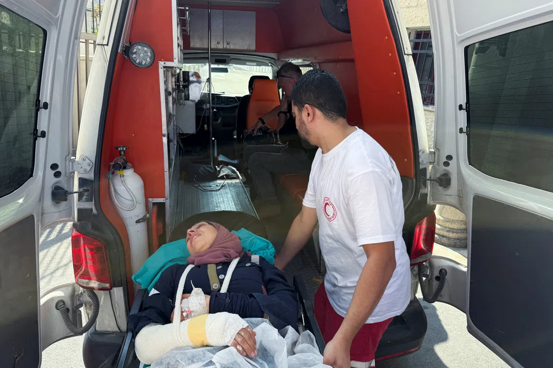 Reuters photographer Raneen Sawafta arrives at a hospital following an Israeli settlers attack near Nablus in the Israeli-occupied West Bank, November 8, 2025. REUTERS/Nidal Eshtayeh
