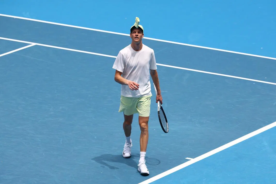 Tennis - Australian Open - Practice - Melbourne Park, Melbourne, Australia - January 9, 2025 Italy's Jannik Sinner watches after throwing his wristband during a practice session ahead of the Australian Open REUTERS/Edgar Su/ File Photo
