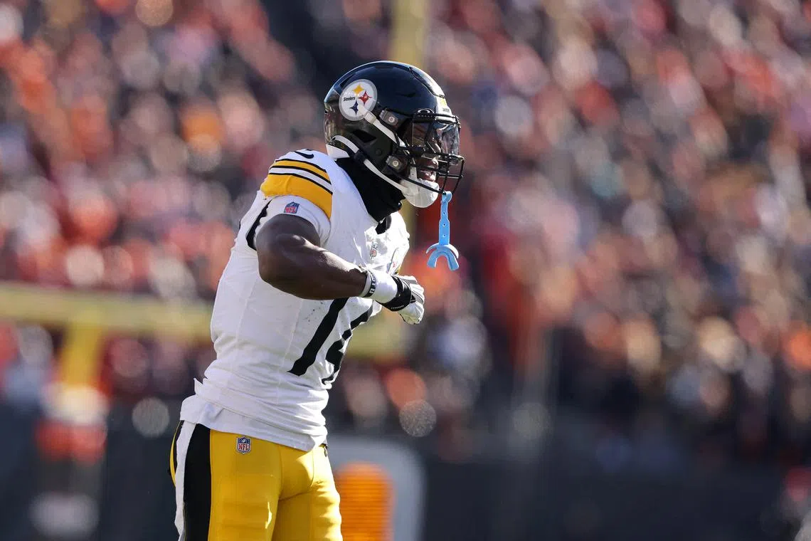 Dec 1, 2024; Cincinnati, Ohio, USA; Pittsburgh Steelers wide receiver George Pickens (14) reacts to a penalty called against him for unsportsmanlike conduct during the second quarter against the Cincinnati Bengals at Paycor Stadium. Joseph Maiorana-Imagn Images/File Photo