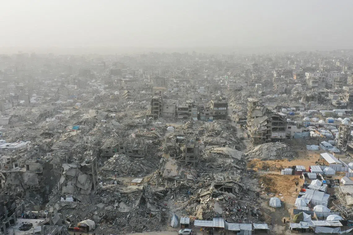A drone view shows houses destroyed during the Israeli offensive, amid a ceasefire between Israel and Hamas, in Beit Hanoun, northern Gaza Strip, on March 5, 2025.