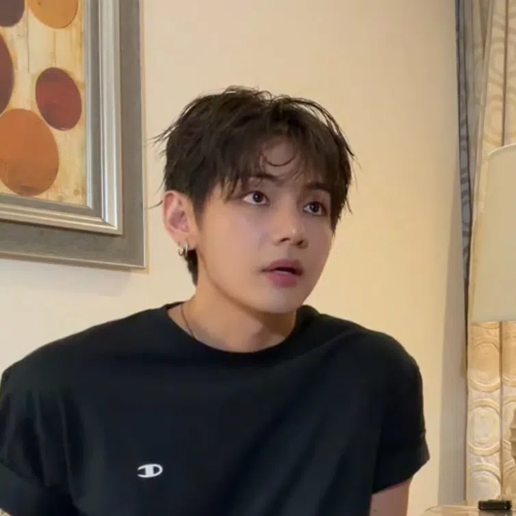 V (left) made the disclosure during a livestream on Weverse with bandmate Jungkook.