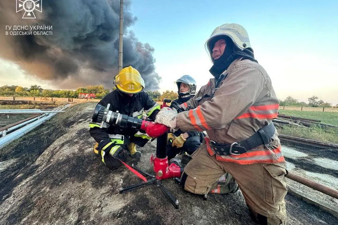 Ukrainian firefighters work at a site of a Russian drone strike, amid Russia's attack on Ukraine, in Odesa region, Ukraine, in this handout picture released on September 6, 2023. State Emergency Service Of Ukraine /Handout via REUTERS