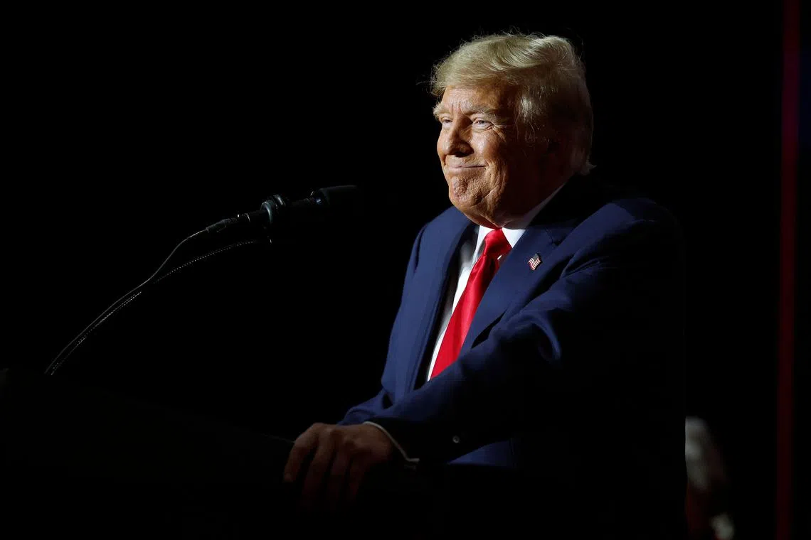 DES MOINES, IOWA - JANUARY 15: Republican presidential candidate, former U.S. President Donald Trump speaks during his caucus night event at the Iowa Events Center on January 15, 2024 in Des Moines, Iowa. Iowans voted today in the state’s caucuses for the first contest in the 2024 Republican presidential nominating process. Trump has been projected winner of the Iowa caucus.   Chip Somodevilla/Getty Images/AFP (Photo by CHIP SOMODEVILLA / GETTY IMAGES NORTH AMERICA / Getty Images via AFP)
