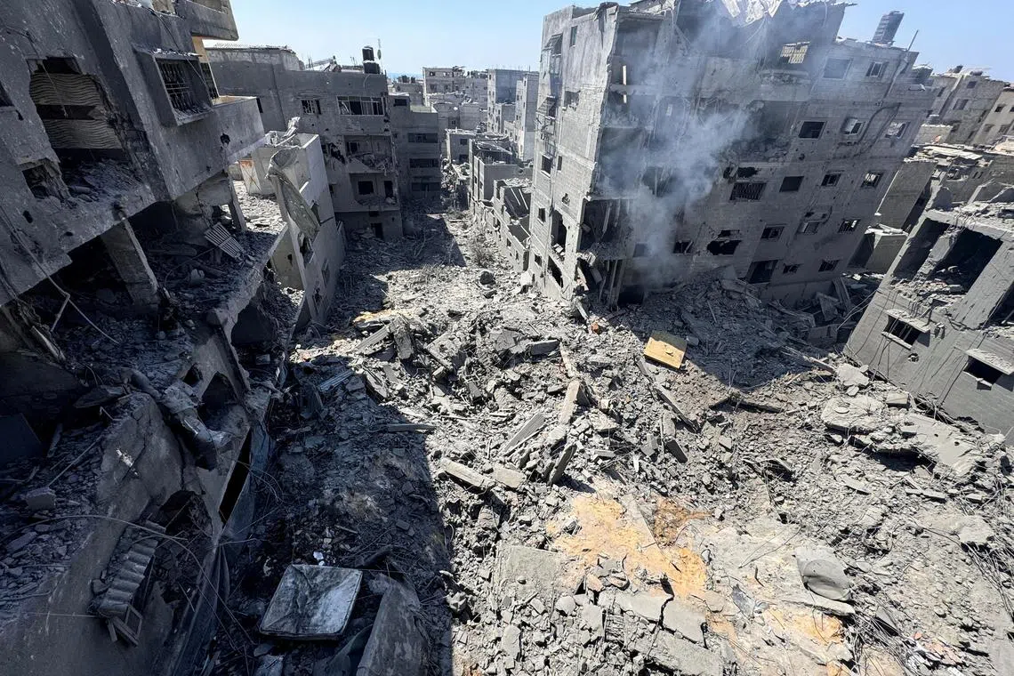 A general view shows the site of Israeli strikes on houses, amid Israel-Hamas conflict, at Al Shati refugee camp in Gaza City, June 22, 2024. REUTERS/Ayman Al Hassi