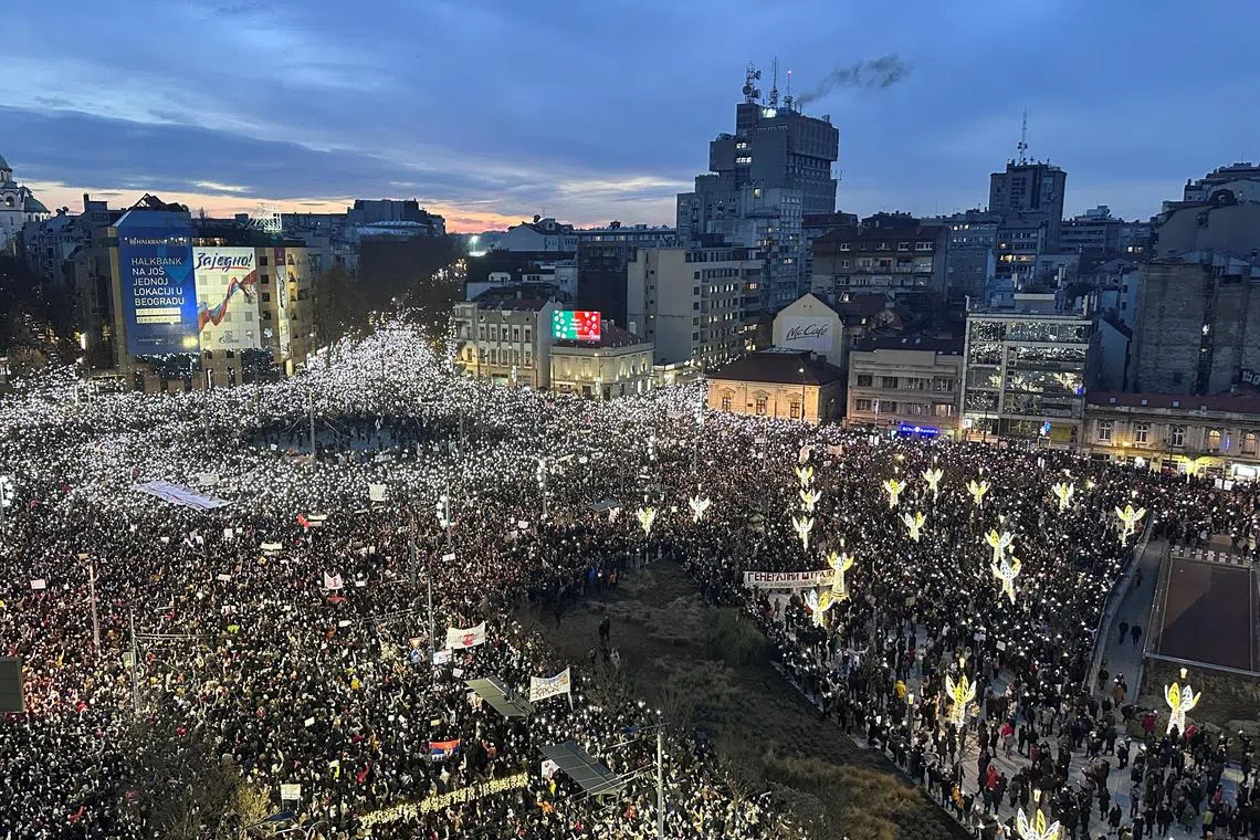Thousands of people filling the streets in Belgrade on Dec 22, to protest against government policies and corruption, following the November deaths of 15 people in a railway station roof collapse.