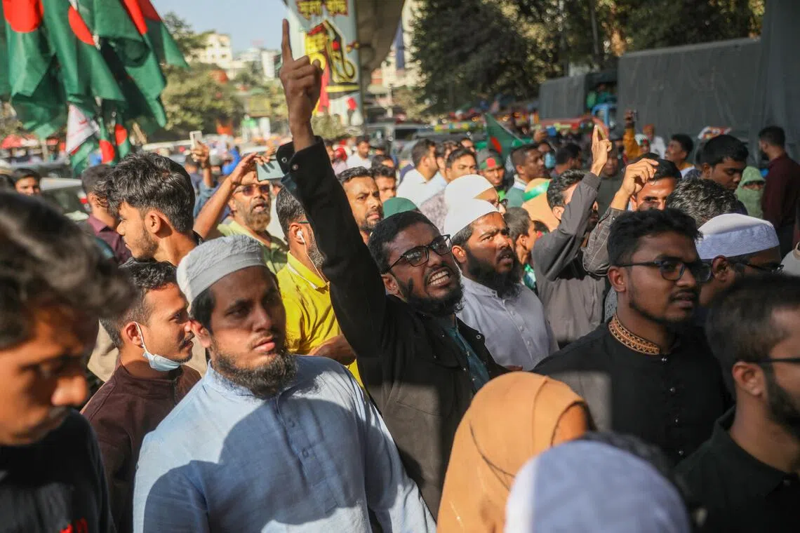 Supporters of Inqilab Mancha and leaders of other political parties took part in a protest calling for justice for Sharif Osman Hadi in front of the National Museum in Dhaka.