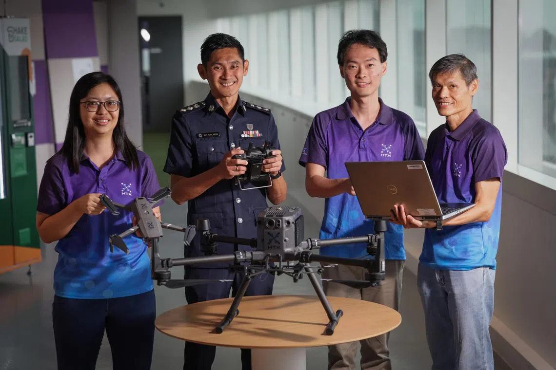 ST20240827_202442000839: Gin Tay/ dshtx08/ David Sun/
(From left): Profile of Miss Lau Yan Ling, Lead Engineer, Q Team; Superintendent Sum Tuck Meng, Head UAV Operations & Training; Mr Yeo Kiat Nern, Engineer, Q Team; and Dr Ng Gee Wah, Director, Q Team; at HTX (Home Team Science & Technology Agency) office, on Aug 27, 2024.