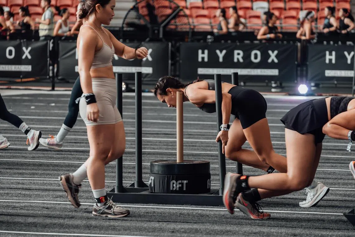 Ms Clea Meyer, 28, trained with running and strength workouts for Hyrox Singapore in October 2023, and continues to run regularly.