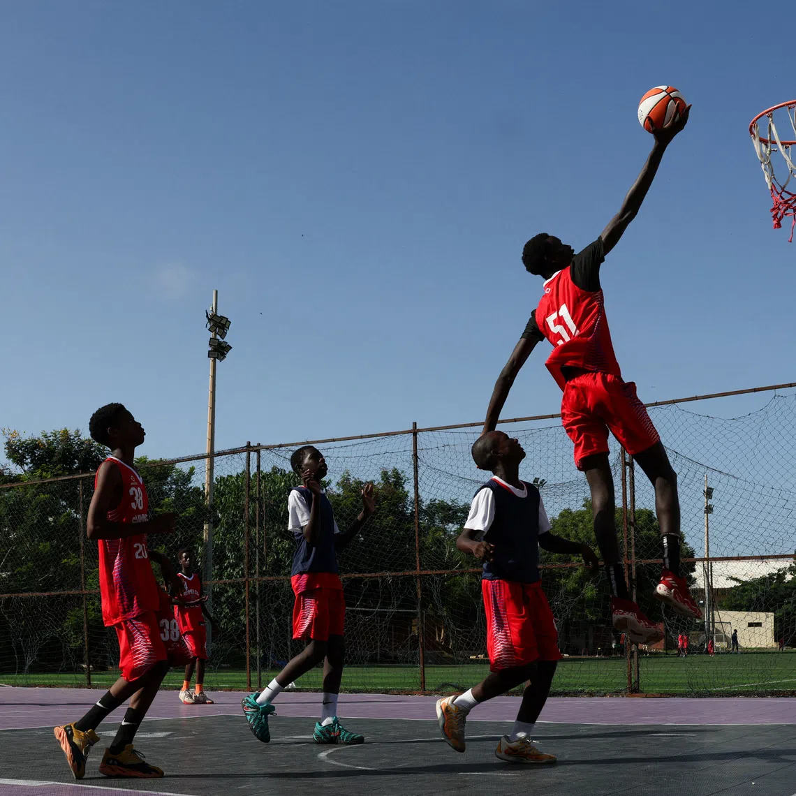 Basketball players train during the Legacy Summer Camp, organised by SEED Project alumnus Pape Latyr Gnigu, in Dakar, Senegal, September 30, 2026. REUTERS/Misper Apawu
