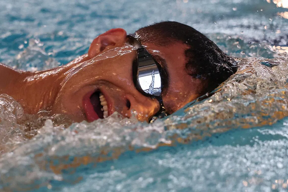 FILE PHOTO: Palestinian Olympic swimmer hopeful, Yazan Al Bawwab, swims during his practice session in Dubai, United Arab Emirates, June 13, 2024. REUTERS/Amr Alfiky/File Photo