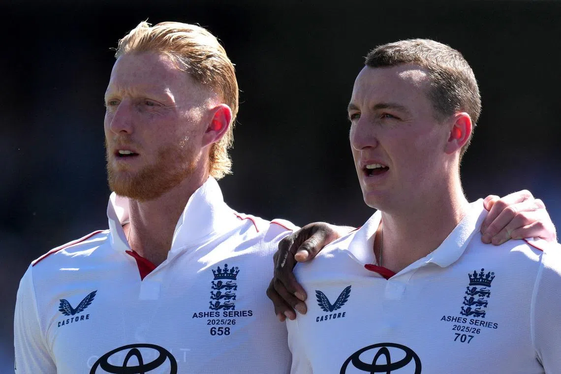Cricket - The Ashes - Australia v England - Third Test - Adelaide Oval, Adelaide, Australia - December 17, 2025 England's Ben Stokes and Harry Brook line up during the national anthems before the match REUTERS/Asanka Brendon Ratnayake
