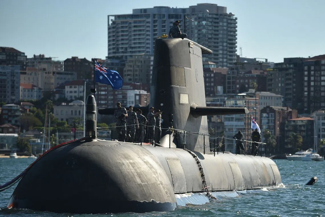The Aukus agreement to transfer nuclear-powered submarines to Australia is being reviewed by the Pentagon.