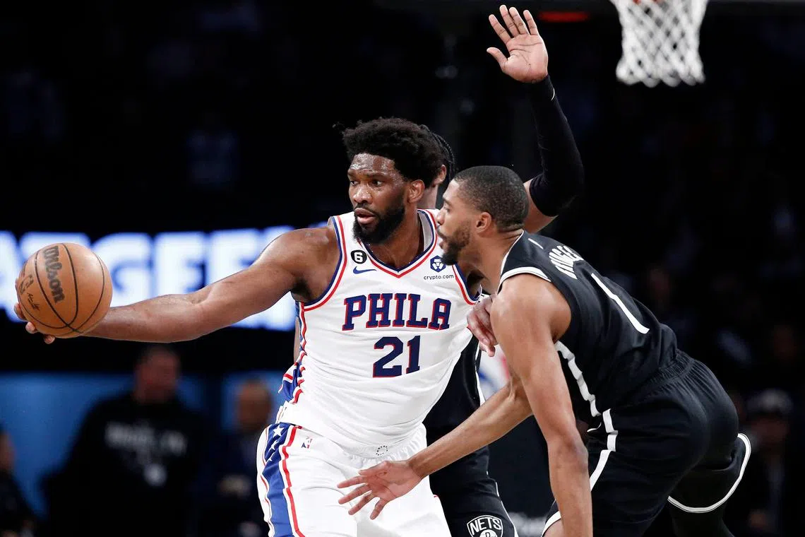 Joel Embiid of the Philadelphia 76ers dribbles against Mikal Bridges of the Brooklyn Nets during the first half of Game 3 of the Eastern Conference play-offs.