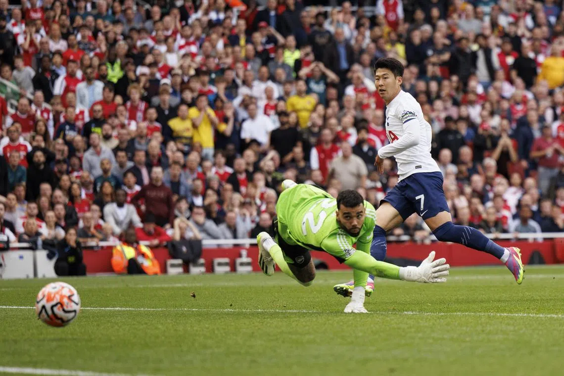 Son Heung-min of Tottenham Hotspur scoring his second equaliser past David Raya in the 2-2 Premier League draw against Arsenal at the Emirates on Sunday.