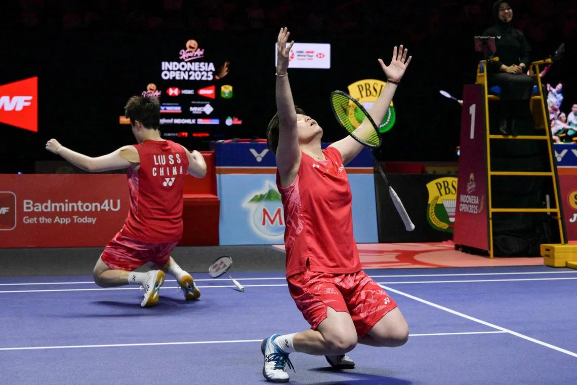 China's Liu Shengshu and Tan Ning celebrating their victory against Malaysia's Pearly Tan and Thinaah Muralitharan during their women's doubles final match at the Indonesia Open badminton tournament, at Istora Senayan in Jakarta, on June 8, 2025. 