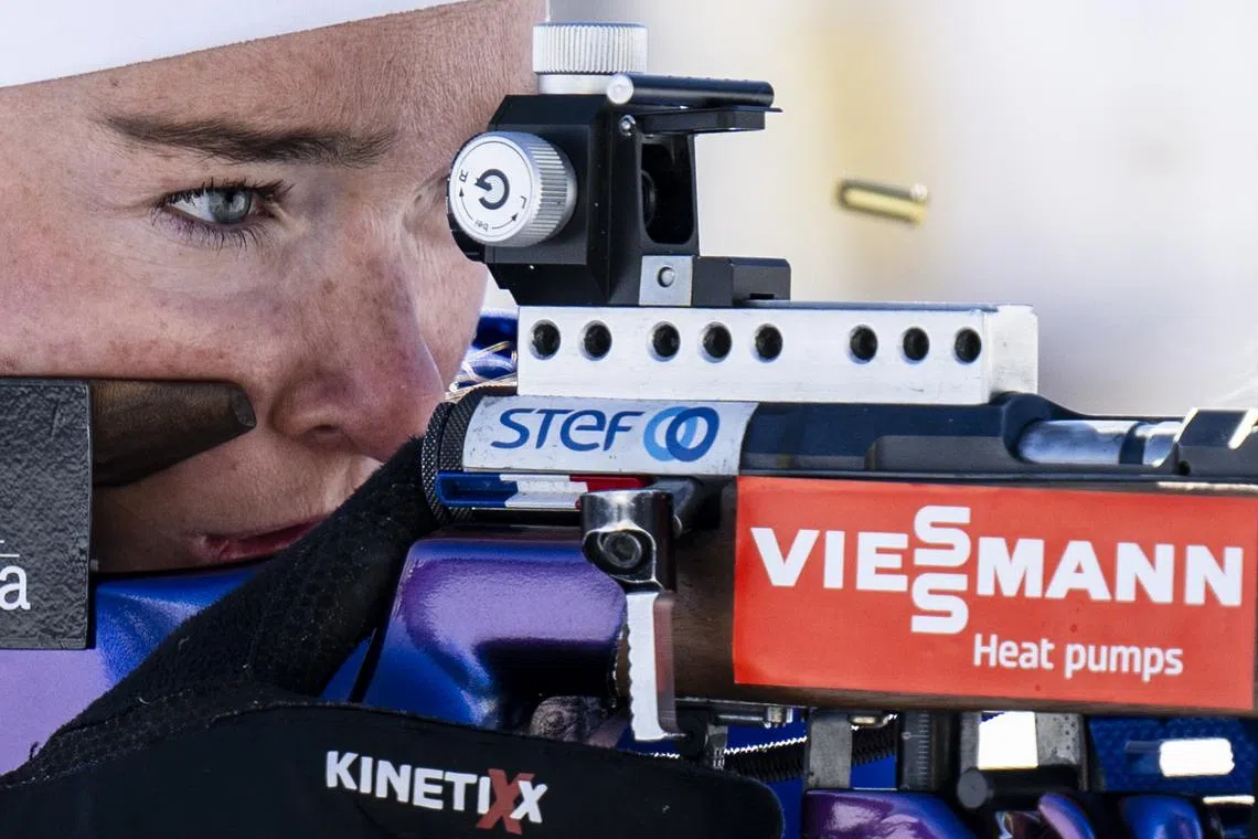 Lou Jeanmonnot of France zeroing in ahead of the Women 15km Individual race at the IBU Biathlon World Championships in Lenzerheide, Switzerland, Feb 18, 2025. 