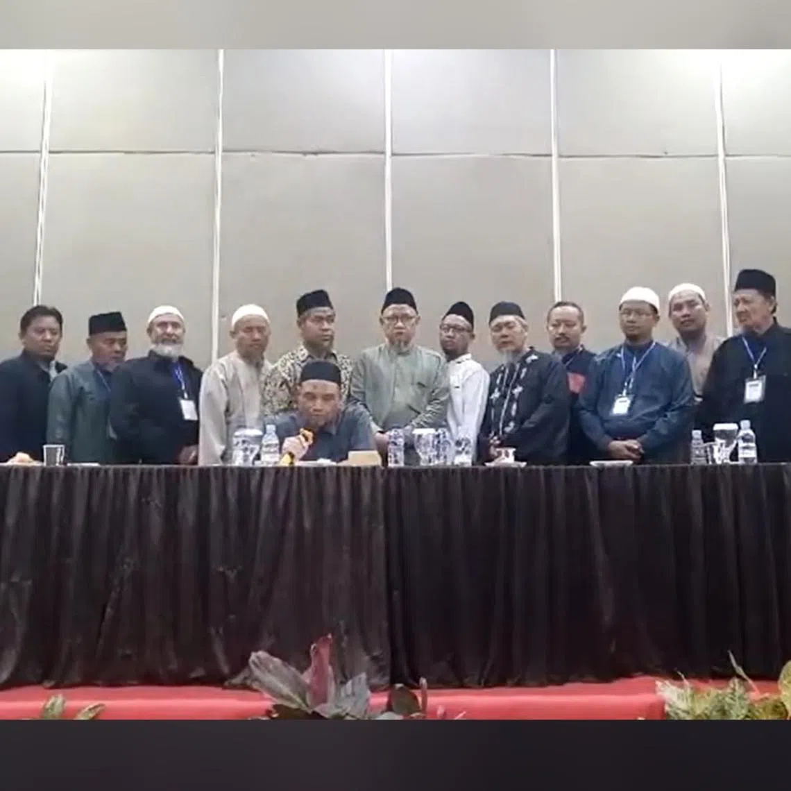 Jemaah Islamiyah in Indonesia's senior leader Abu Rusdan (seated) with other members declaring on June 30 that the terror group has been dissolved.
