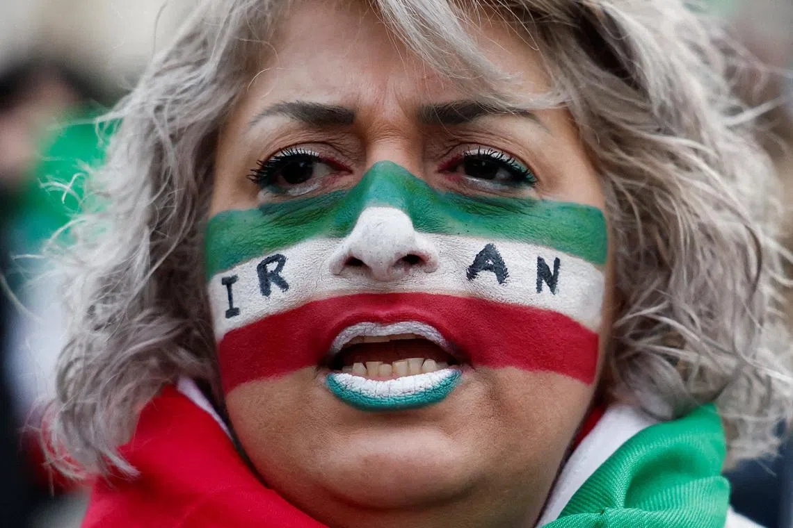 A demonstrator attends a rally in support of the Iranian people amid anti-government protests raging across Iran, in Paris, France, January 11. REUTERS/Benoit Tessier
