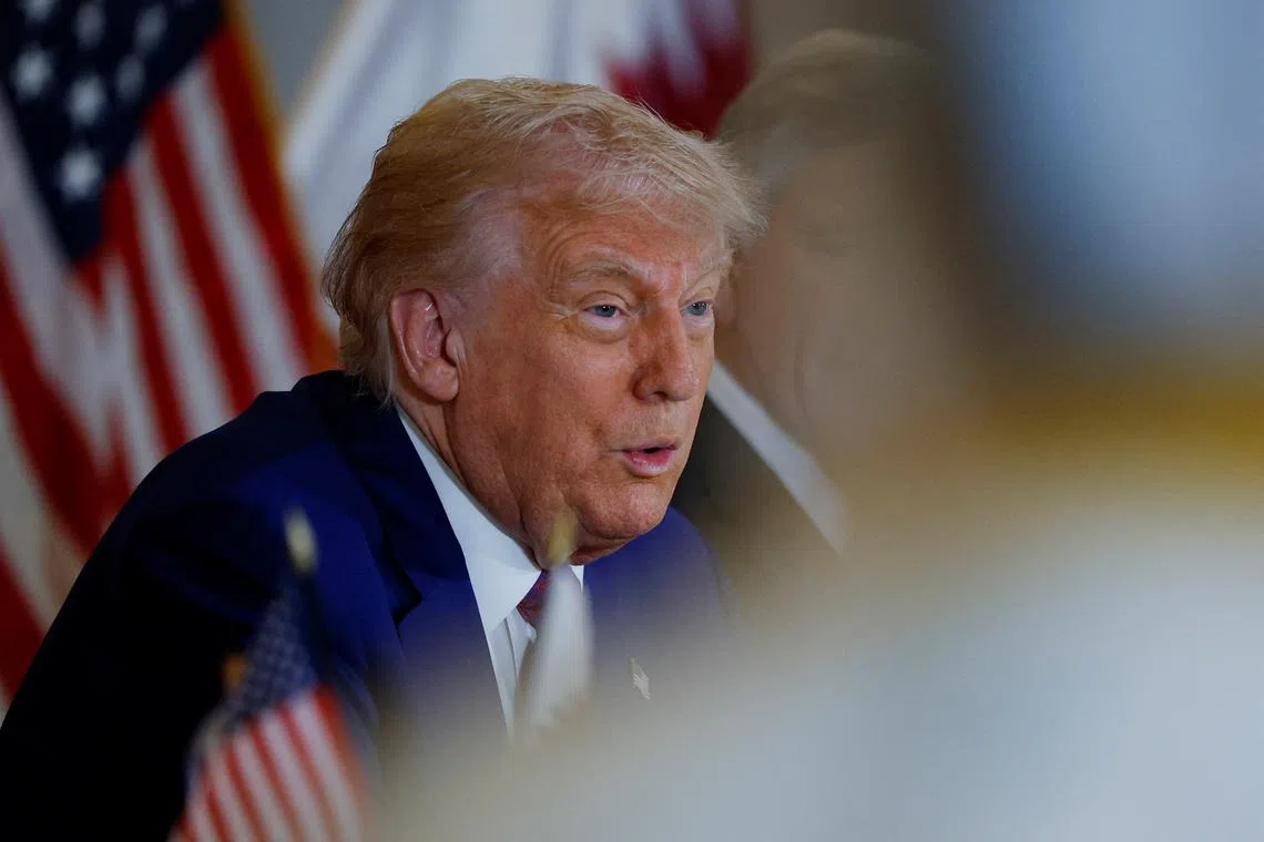 U.S. President Donald Trump speaks during a roundtable discussion in Doha, Qatar, May 15, 2025. REUTERS/Brian Snyder