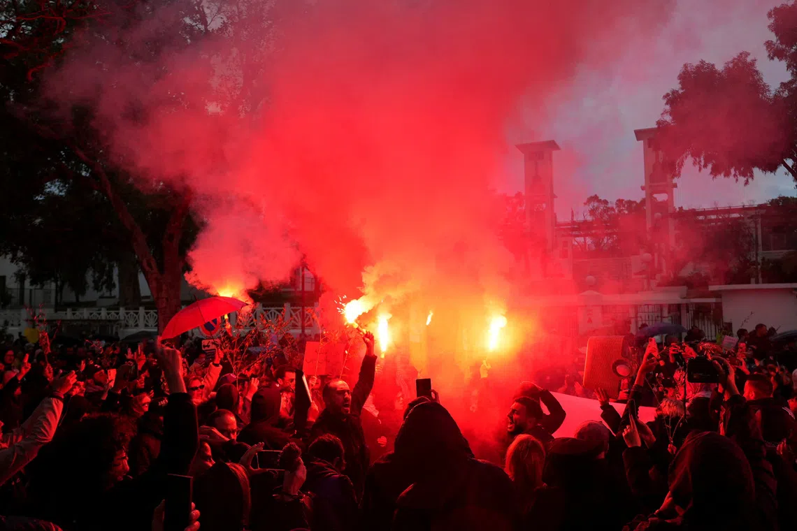 Protesters take part in a protest against Tunisia's President Kais Saied, accusing him of entrenching one-man rule through the use of the judiciary and police, in Tunis, Tunisia November 22, 2025. REUTERS/Jihed Abidellaou